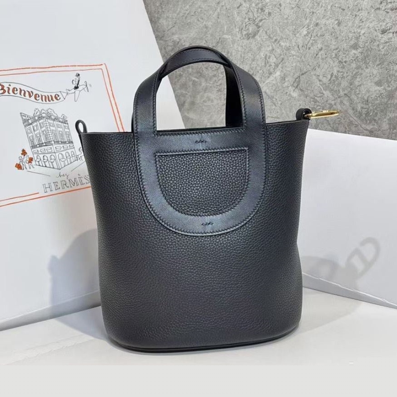H**mes shopping bags
